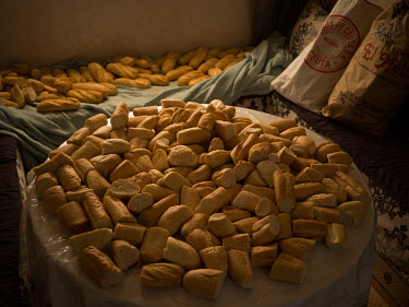 Bread on a table at the home of Sabah Ahmed (59), a Muslim resident of the Spanish exclave of Ceuta, who is organising help for the many newly arrived migrants who breached the territory's borders whe...