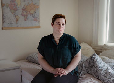 Eirin Kristin (29) from Balsfjord sits on the bed in her home in Oslo. She was shot four - in the stomach, arm, right knee and right armpit - times during the terrorist attack carried out by Anders Br...