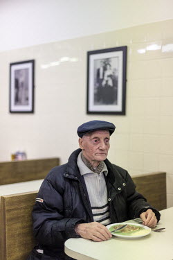 An elderly customer at Arments Pie and Mash shop.