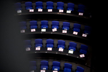 A note reading 'Kein Sitzplatz No Seating Bitte Frei Lassen' (keep free), placed on chairs as delegates practice social distancing at the German parliament Deutscher Bundestag.