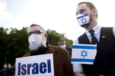 Pro-Israeli protestors during a rally of the German Jewish community and political parties in front of the Brandenburger Gate in solidarity with Israel and against anti-semitism and racism.