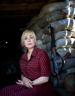 Natalia Voronkova (44), a volunteer who offers support and basic first aid training for Ukrainian government forces fighting Russian-backed separatists in the east of the country, at a military positi...