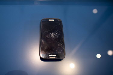 A refugee's broken smartphone from the section A European History of Forced Migration on display at the Museum and Documentation Centre of the Foundation Escape, Flight, Expulsion and Reconciliation....