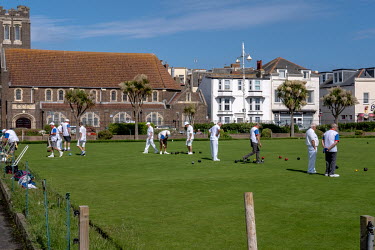 People playing crown green bowls at the Waterloo Square Bowling Club in Bognor Regis.