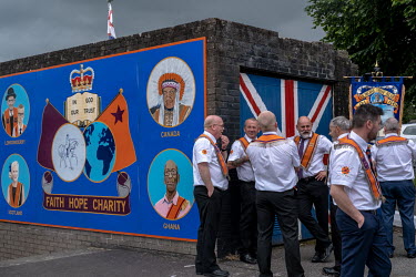 Orangemen relax in the Loyalist Fountain Estateafter marching through Derry/Londonderry.