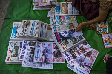Newspapers and weekly journals are folded before delivery.