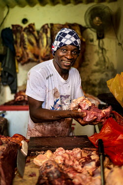 ''Since I was tied to my mother's back I am a butcher'', says Ibrahima Thiam with a laugh in his shop in the Sor market.