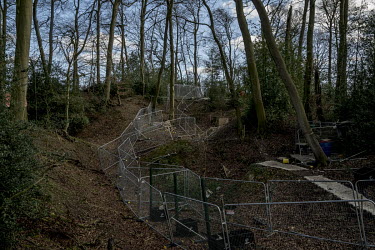 Security fencing splits Jone's Hill Wood, the inspiration for Roald Dahl's Fantasic Mr Fox. Trees to the right of the fence are to be felled to make way for the HS2 high speed rail link that will conn...