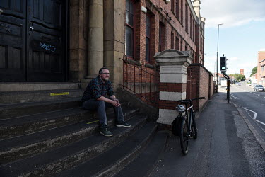 Adam Tranter, the city's Cycling Mayor, sits on the steps of the original building that was home to Edward O'Brien's Challenge Cycles and Co, one of Coventry's historic cycle factories, which has fall...