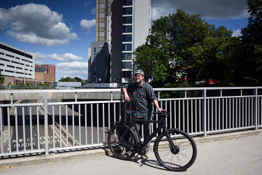Adam Tranter, Bicycle Mayor for Coventry stands above the city's busy ring road that makes cycling in Coventry unappealing to many people.