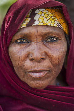 Haja Maira who fled from fighting near the border with Niger in the north: 'My neighbour lost three children during an explosion, it was terrible', she says. 'Now we have no water, no medicine and no...