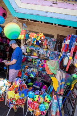 A shop selling various beach toys and games.  Sheringham is a Victorian-era English seaside resort that was popular up through the 1950s before mass travel to other parts of Europe became easily affor...