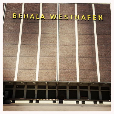 An industrial building in the Behala Westhafen district.  The Berlin district of Moabit is an artificial island completely surrounded by water that was once home to various industries and staunchly w...