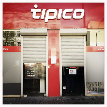 The now closed Tipico betting shop.  The Berlin district of Moabit is an artificial island completely surrounded by water that was once home to various industries and staunchly working-class . However...