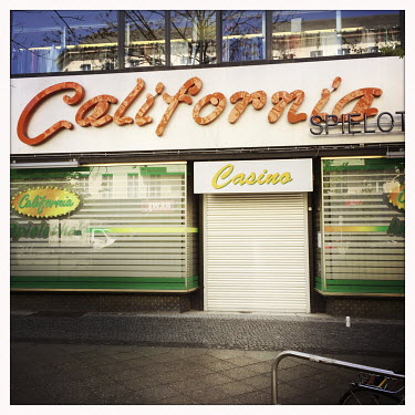The now closed California Casino betting shop.  The Berlin district of Moabit is an artificial island completely surrounded by water that was once home to various industries and staunchly working-clas...