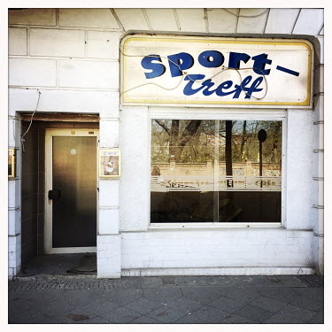 The facade of the now closed pub Sporttreff in Moabit.  The Berlin district of Moabit is an artificial island completely surrounded by water that was once home to various industries and staunchly work...