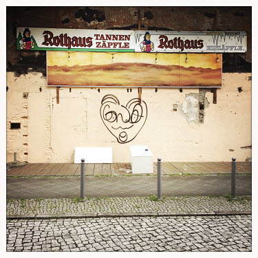 The facade of the closed-down Rothaus TannenZaepfle pub.  The Berlin district of Moabit is an artificial island completely surrounded by water that was once home to various industries and staunchly wo...