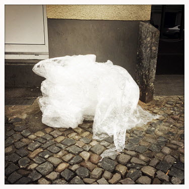 Rubbish on the street.  The Berlin district of Moabit is an artificial island completely surrounded by water that was once home to various industries and staunchly working-class . However, with gentri...