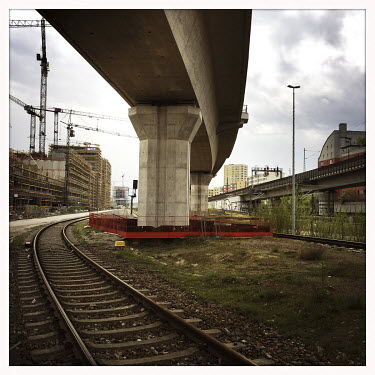 Railway tracks and a bridge near the Europacity Heidestrasse building site.  The Berlin district of Moabit is an artificial island completely surrounded by water that was once home to various industri...