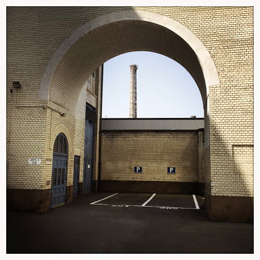 A building within the Huttenkiez industrial area.  The Berlin district of Moabit is an artificial island completely surrounded by water that was once home to various industries and staunchly working-c...