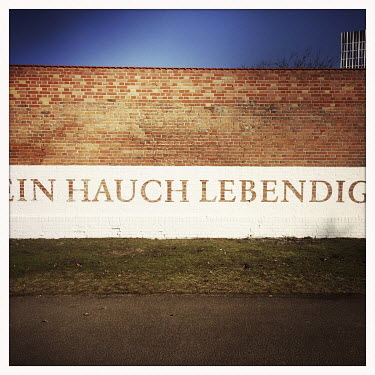 A line from the Moabit Sonnets written on the preserved walls of the former Moabit prison, Geschichtspark Zellengefaengnis Moabit, now a memorial park in memory of Albrecht Haushofer, 1903 â�" 23 Apr...