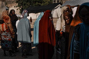 Women queuing for aid at an IDP camp in Gwoza.