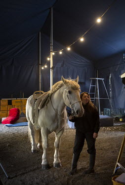 Groom Camille Smith with Tony the horse prior to ring rehearsals with equestrienne Rebecca Musselwhite (not pictured).  Giffords Circus have been rehearsing for 'The Hooley', their 2021 show, postpone...