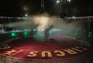 A man sweeps the big top carpet as Giffords Circus prepares to return with their 2021 show, 'The Hooley', a celebration of Irish dance and culture, postponed from 2020 due to the COVID-19 pandemic. Th...