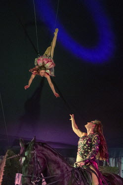 Rebecca Musselwhite, riding Tony the horse, and Lil Rice performing their equestrian routine in the big top as Giffords Circus returns with their 2021 show, 'The Hooley', a celebration of Irish dance...