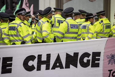 Police on duty during an Extinction Rebellion march and occupation in London's West End.