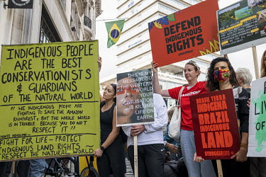 Activists gather with placards for the 'Amazon Rebellion' outside the Brazilian Embassy. The protest was joined by various NGOs and activist groups including by by Brazil Matters, CAFOD, Extinction Re...