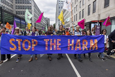 Extinction Rebellion activists take part in the 'Stop the Harm' march from Hyde Park to the Department for Business, Energy and Industrial Strategy.
