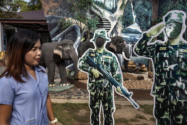 Model elephants and photo cut out park ranger figures for tourist's pictures at a visitor centre in Khao Yai National Park.