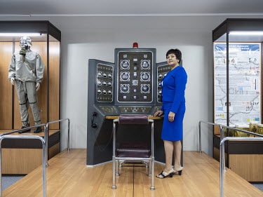 A guide at the Semipalatinsk Nuclear Test Site Museum in Kurchatov demonstrates the control console for 'Operation First Lightning', the test of the first Soviet atomic bomb in 1949. From 1949 until 1...