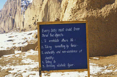 A notice board near the small, or 'Eastern' Buddha of Bamiyan tells people, amongst other things to avoid anihilating other life, taking things by force and telling lies. The Buddhas were destroyed by...