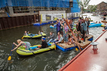 'Canalival', a flash mob event in London's East End, during which revelers launched inflatable dinghies and other home made watercraft into the Regent s Canal for a day long floating party. Advertised...