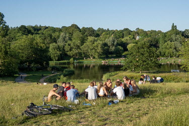 A group of young people on Hampstead Heath when Covid restrictions were being relaxed by the government despite the spread of the more contagious Delta variant.