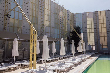 A high wall surrounds the women only section of the swimming pool at the Selge Beach report near Alanya, southern Turkey. The hotel was converted into a halal friendly hotel, and the swimming pool has...