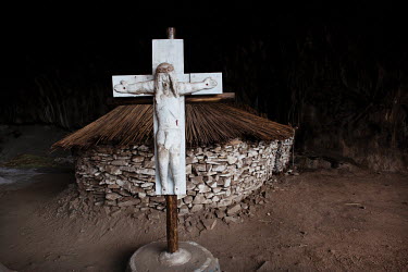 A crucifix inside one of the Motouleng caves. Izangoma (healers), izinyanga (herbalists) as well as followers of various Zion-based churches often frequent the Motouleng caves for spiritual fulfilment...