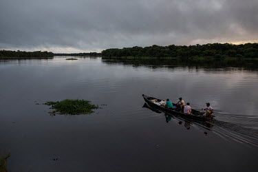 A boat passes near the quilombola (founded by escaped slaves) community of Pedras Negras in Rondonia.