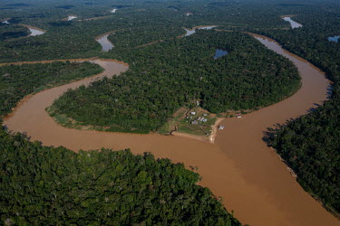 The base of FUNAI, the National Indian Foundation, Brazil's government body that establishes and carries out policies relating to indigenous peoples, at the confluence of the Itacoai and Javari Rivers...
