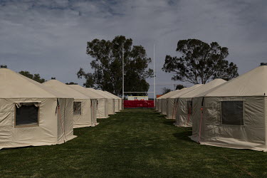 Emergency temporary housing set up on the main oval in town for essential workers.
