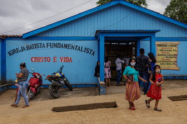 The faithful leave the Fundamentalist Baptist Church in the village of Atalia do Norte in the Vale do Javari indigenous territory.