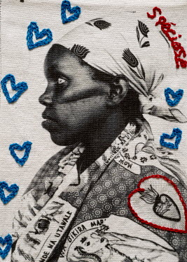 A photograph printed onto cotton and embroidered by the photographer.  Speciose Mukakibibi, aged 37, was attacked with a machete during the genocide while she was pregnant. Her husband and three of...