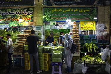 Displays of fruit and vegetables in a market in the Tajrish district in the afluent north of Tehran.
