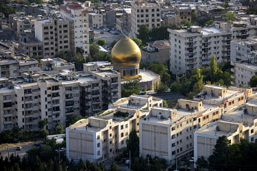 A mosque among apartment buildings.