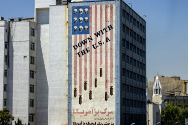 'Down with the USA', an anti-American mural painted on the side of an apartment block.