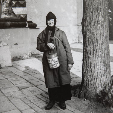 A Russian Orthodox nun, collecting alms in Zagorsk.From the series 'Russian Portraits', photos and interviews with ordinary Russians as their country stood at an ideological crossroads during presiden...