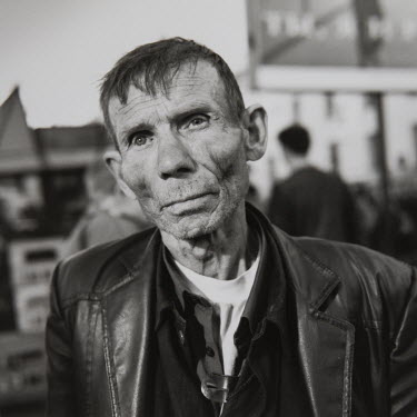 A man at Yaroslavsky station in Moscow. He was just released from prison and was trying to obtain a ticket to return to the Komi Republic, an autonomous region near the Arctic Circle.  From the series...