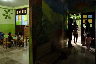 Women leave their children in the kindergarten of the centre for female victims of gender based violence.